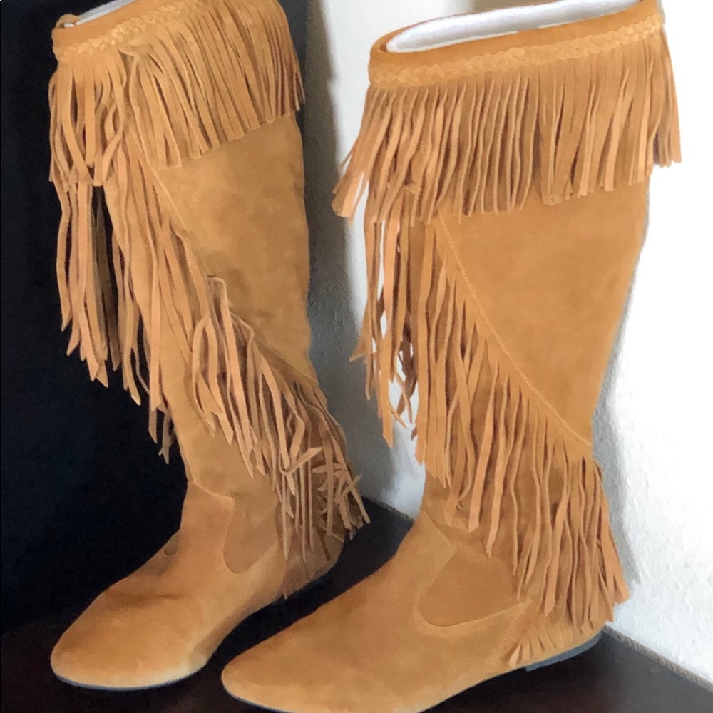 Sam Edelman tan suede fringe boots.
